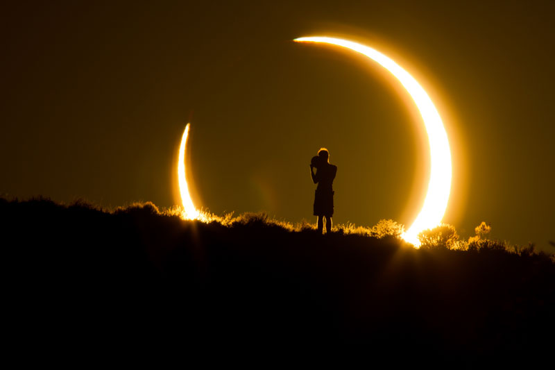 Albuquerque, NM: An Onlooker Witnesses the Annular Solar Eclipse as the Sun Sets on May 20, 2012. Colleen Pinski, Finalist – The Natural World.